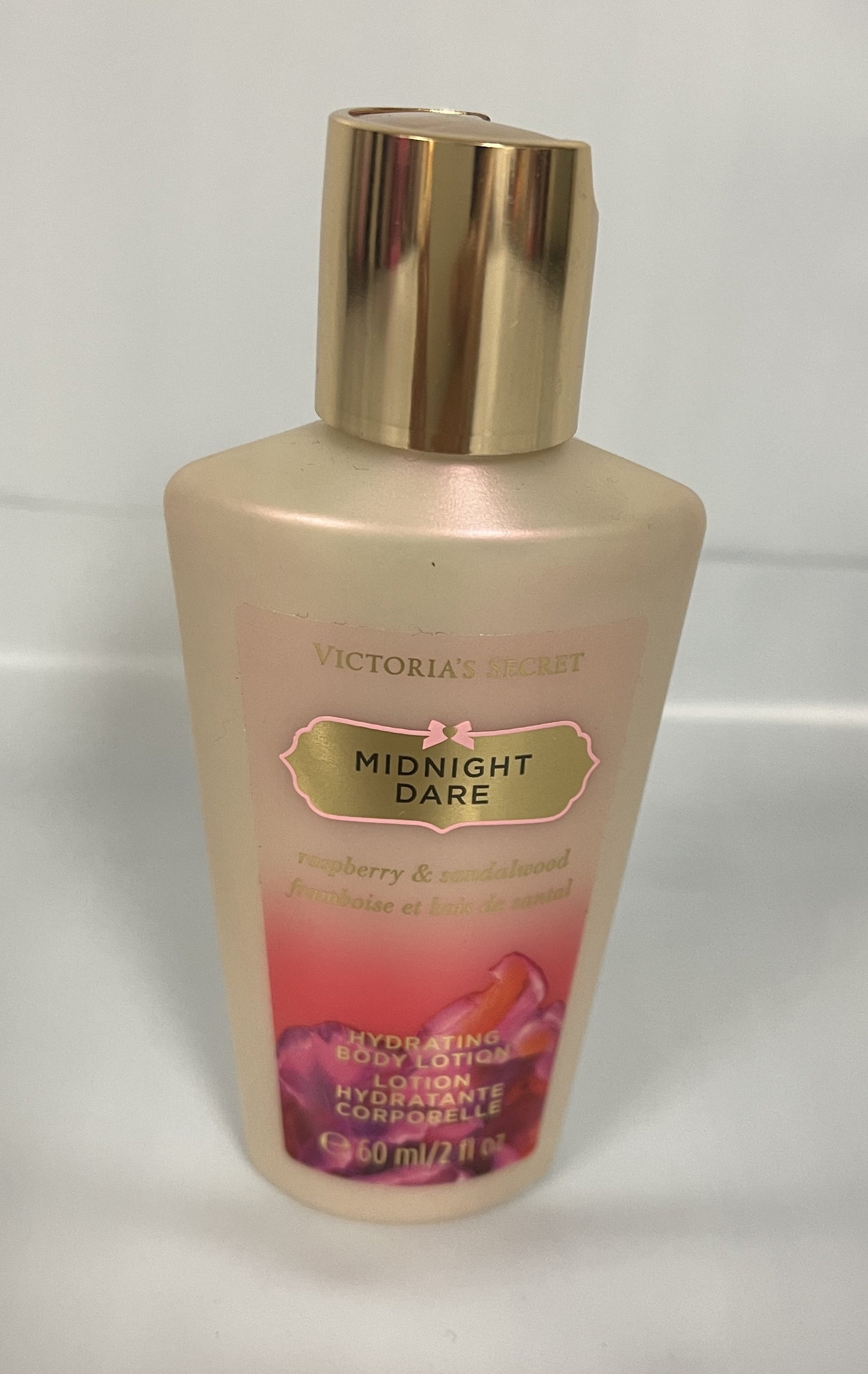 Victoria's Secret Midnight Dare Hydrating Body Lotion 2fl oz. Travel Size Rasberry Sandalwood