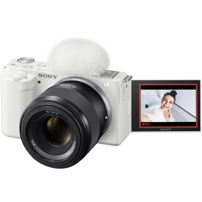 Sony ZV-E10 Mirrorless Alpha APS-C Vlog Camera Body and 50mm F1.8 Large Aperture FE Lens SEL50F18F ILCZV-E10/W White Bundle with Deco Gear Case + Extra Battery + Photo Video Accessories Kit