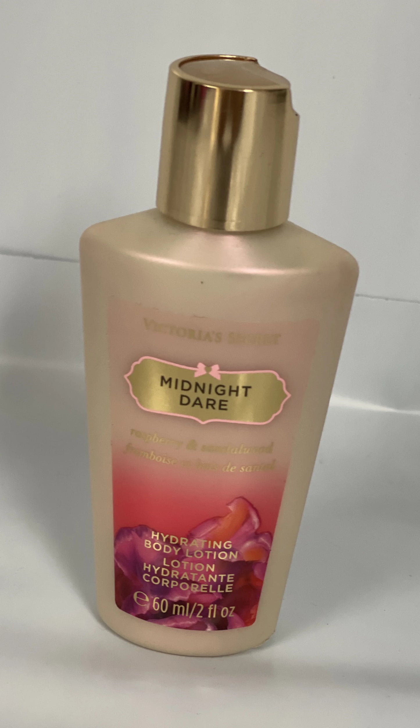 Victoria's Secret Midnight Dare Hydrating Body Lotion 2fl oz. Travel Size Rasberry Sandalwood